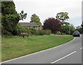 Bench on a bank above Church Road, Leckhampton