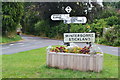 Traffic island at entrance to Winterbourne Stickland