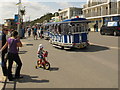 Land train and child cyclist by Boscombe Pier