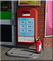 Postbox with advertising, Stony Stratford