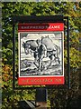 The Woolpack Inn sign