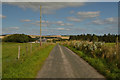 NJ8519 : Country Lane near Hill of Middleton, Aberdeenshire by Andrew Tryon