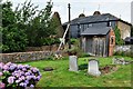 West Farleigh, All Saints Churchyard: Oast House conversion viewed from it