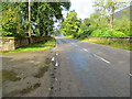 Wall-lined road (A832) near to Lochrosque Lodge