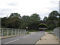 Railway bridge over the road from Little Oakley