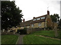 Cottages by the churchyard, Geddington