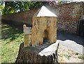 A carving of the gatehouse at Faversham Abbey