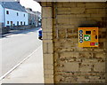 Yellow box on a bus shelter wall, Ewenny Road, St Brides Major