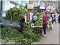 Selling hop garlands and head dresses at Faversham Hop Festival