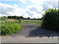 SJ6631 : Field entrance off Sutton Lane by JThomas