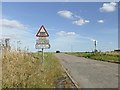 Level crossing warning sign