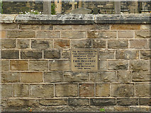 SE2028 : St Paul, Birkenshaw - churchyard plaque by Stephen Craven
