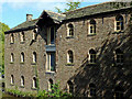 Converted canalside warehouse by Marple Locks, Stockport