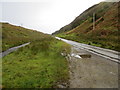NM9838 : Road (B845) beside a tributary of Dearg Abhainn in Gleann Salach by Peter Wood