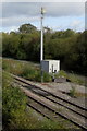 Telecoms mast and cabinet alongside the Welsh Marches Line, Leominster