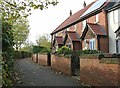 Path past houses on Devlin Drive