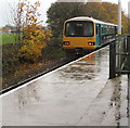 Class 143 dmu leaving rainy Rhiwbina station, Cardiff