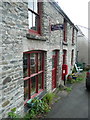 Sign for telephone on former post office, Gwernogle