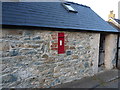 Victorian postbox in an outbuilding