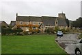 Houses by Ducklington green