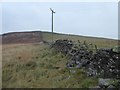 Looking up to Townlaw Cairn