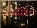 View of Sonic Runway reflected in the top of a bollard outside Boxpark Wembley