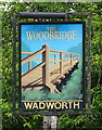 Sign for the Woodbridge Inn