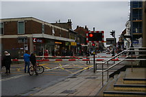 SK9770 : Lincoln: High Street level crossing by Christopher Hilton