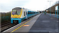 A Transport for Wales service departing from Port Talbot Parkway