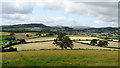 View towards Craven Arms & Stoke Wood from below Halford Wood