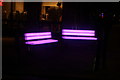 TQ2880 : View of illuminated benches on the corner of Duke Street and Weighhouse Street by Robert Lamb