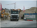 Chalk dust from building site being carried on to Refectory Road