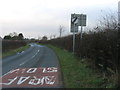 The B4421 leaving Newborough