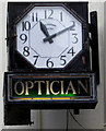 Clock on the wall above Stroud Vision Centre