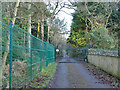 Gated drive into Cottingley Wood