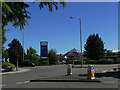 Grahams Road roundabout with sign for Tesco