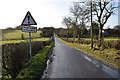 Flood warning notice along Longhill Road