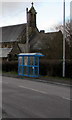 Blue bus shelter near St Mary