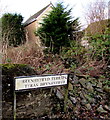 English/Welsh name sign at a bend in the A4109, Seven Sisters