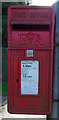 TA2725 : Elizabeth II postbox on Station Road, Ottringham by JThomas