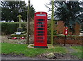 TA2618 : Elizabeth II postbox and telephone box on Sunk Island Road, Sunk Island by JThomas