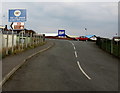 Beach and railway station direction sign, Pensarn