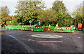 Green temporary barriers on a Whitminster corner