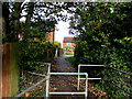 Metal barriers across a Whitminster path