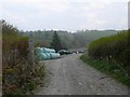 SH8828 : Path going through a farmyard near Afon Fechan by Eirian Evans