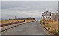 J1505 : Service Road leading South-westwards to the landward end of the jetty at Gyles Quay by Eric Jones