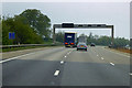 SE3833 : M1 Motorway near Thorpe Park by David Dixon