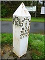 Old Milepost by the former A390 at roundabout