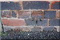 Benchmark on Connelly Court, Chester Street