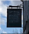 The sign of the Top House